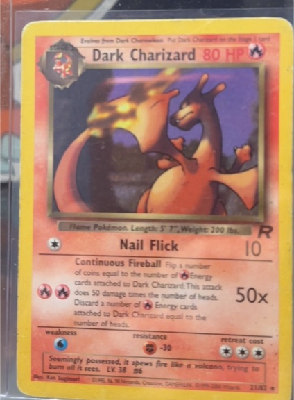 1999 Pokémon Team Rocket #21 Dark Charizard — front