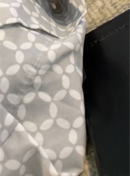 Gray and White Patterned Fabric or Textile — front