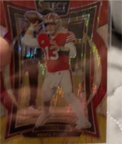 2024 Panini Select Concourse #37 Brock Purdy Red & Black Shock Prizm — front