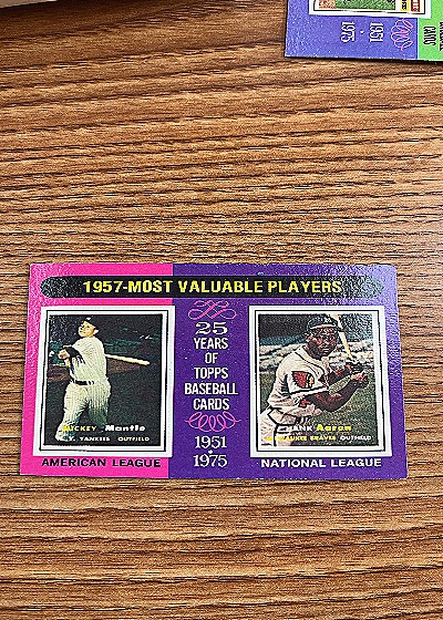 1975 Topps #195 Mickey Mantle & Hank Aaron 1957 MVP — front