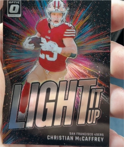 2024 Panini Donruss Optic #16 Christian McCaffrey Light It Up — front