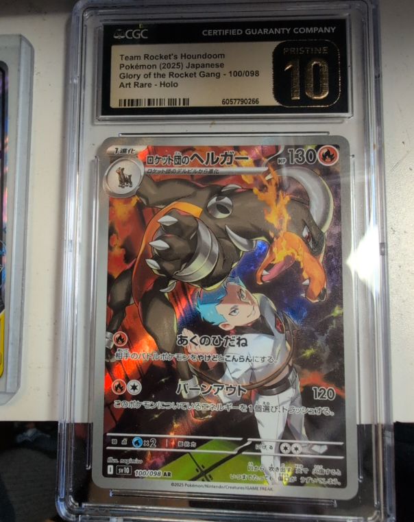 2025 Pokémon #100 Team Rocket's Houndoom — front