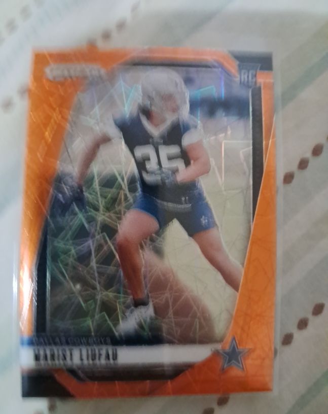 2024 Panini Prizm #372 Marist Liufau Orange Lazer Prizm RC Dallas Cowboys — front