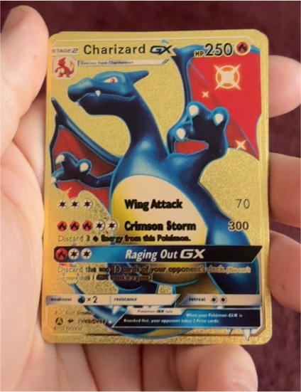 2017 Pokémon TCG Hidden Fates #SV49 Charizard GX — front