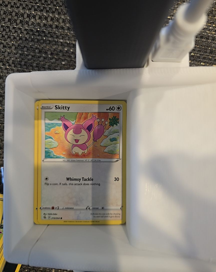 2021 Pokémon #210 Skitty — front