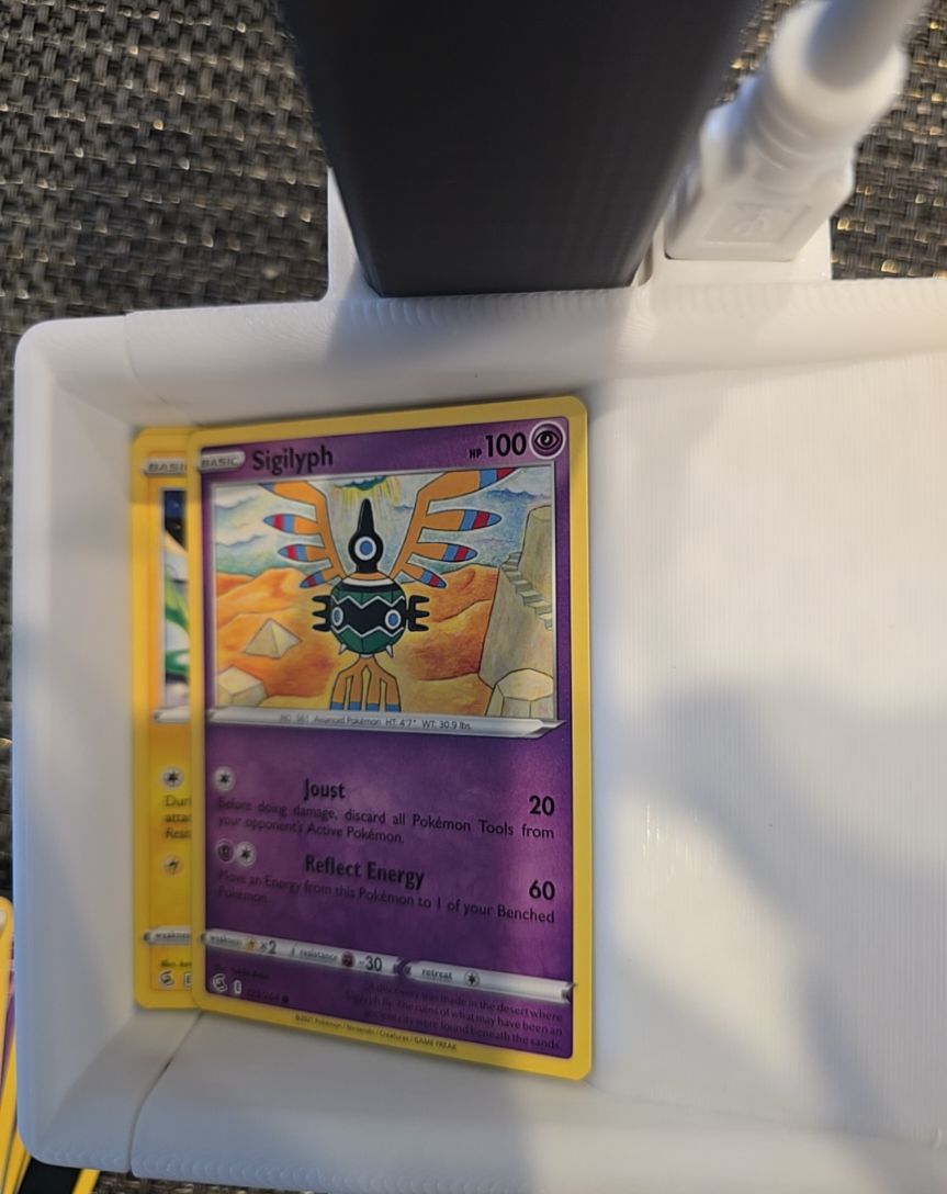 2021 Pokémon Fusion Strike #123 Sigilyph — front