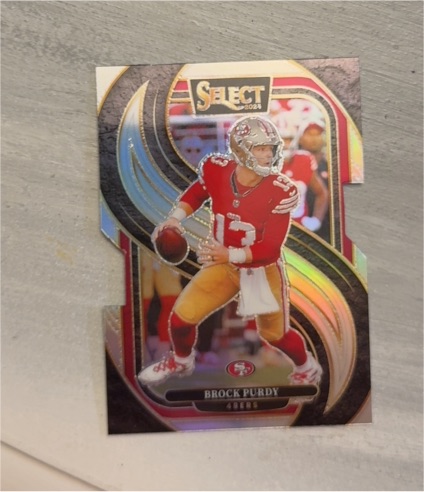 2024 Panini Select Premier Level Silver Prizm Die-Cut #124 Brock Purdy — front