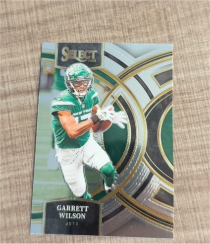 2023 Panini Select Premier Level #115 Garrett Wilson — front