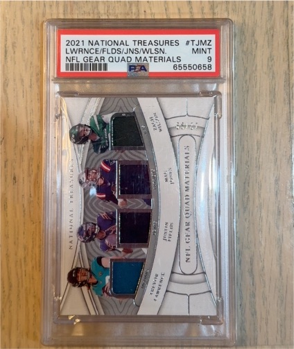 2021 Panini National Treasures #TJMZ Trevor Lawrence/Josh Allen/Justin Fields/Jalen Waddle NFL Gear Quad Materials — front