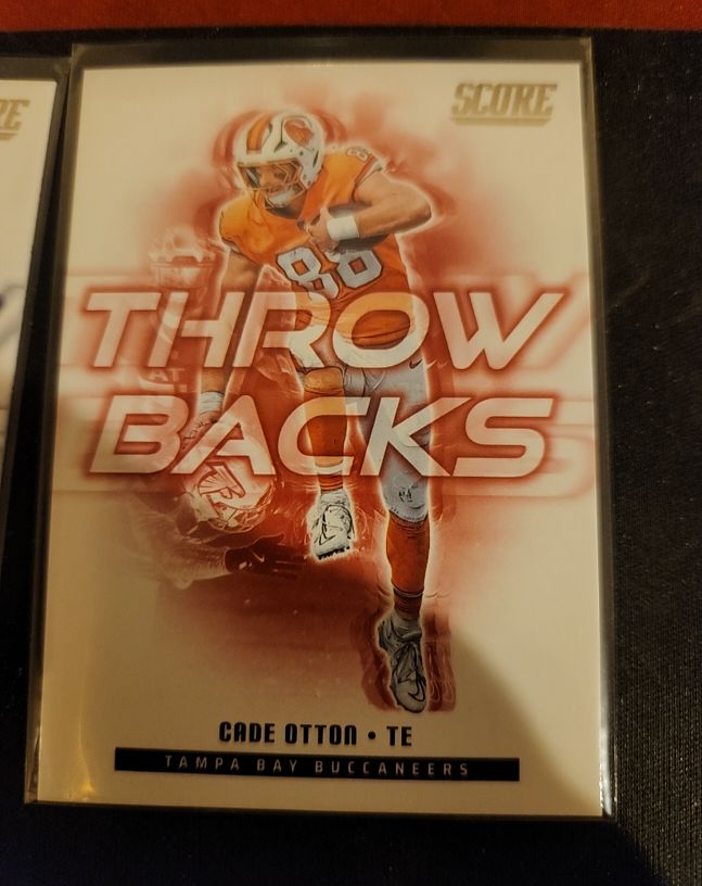 2025 Panini Score #19 Cade Otton Throw Backs — front