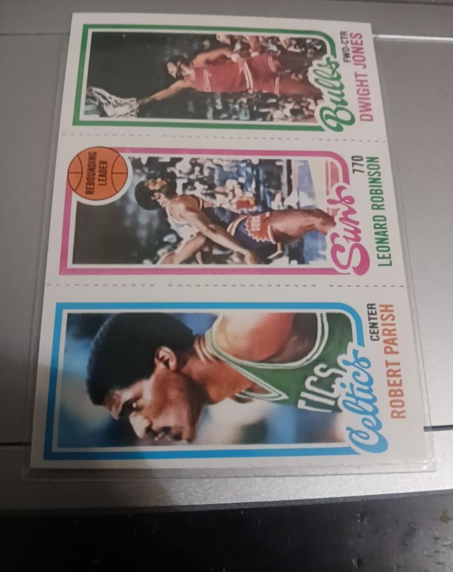 1980-81 Topps #46 Dwight Jones / Leonard Robinson / Robert Parish — front