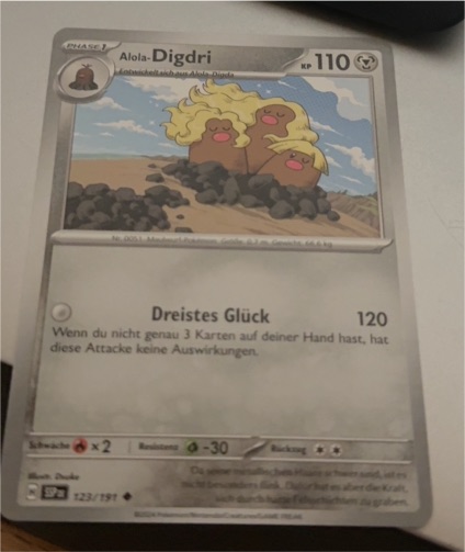2023 Pokémon SV08: Surging Sparks #123 Alolan Dugtrio — front