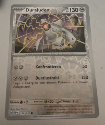 2024 Pokémon Scarlet & Violet Surging Sparks #129 Duraludon — front
