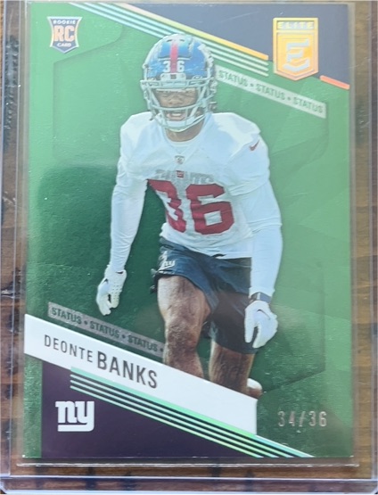 2023 Donruss Elite #129 Deonte Banks Status Green Disco #34/36 — front