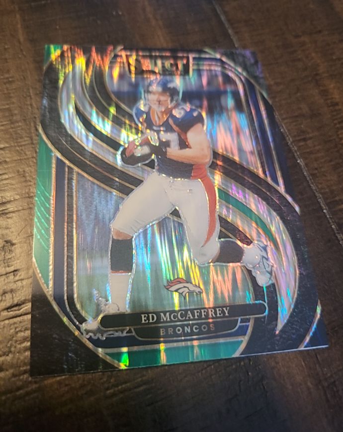 2024 Panini Select - Premier Level Ed McCaffrey #154 Black & Green Shock Prizm — front