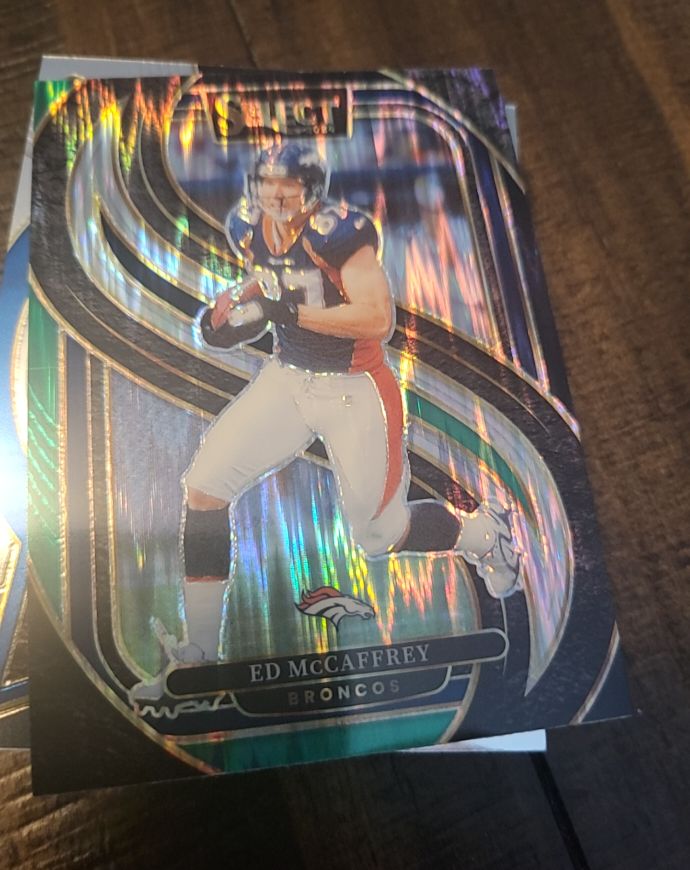 2024 Panini Select - Premier Level Ed McCaffrey #154 Black & Green Shock Prizm — front