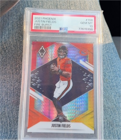 2021 Panini Phoenix #108 Justin Fields Fire Burst Rookie — front