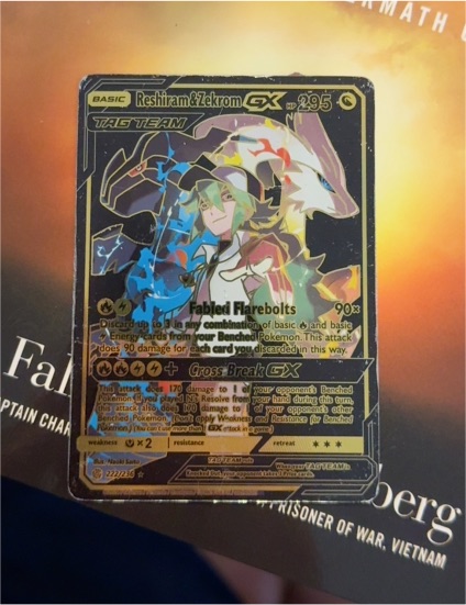 2017 Pokémon SM Black Star Promo #222 Reshiram & Zekrom GX — front