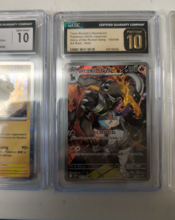 Pokémon (2025) Team Rocket's Houndoom #100/098 — front