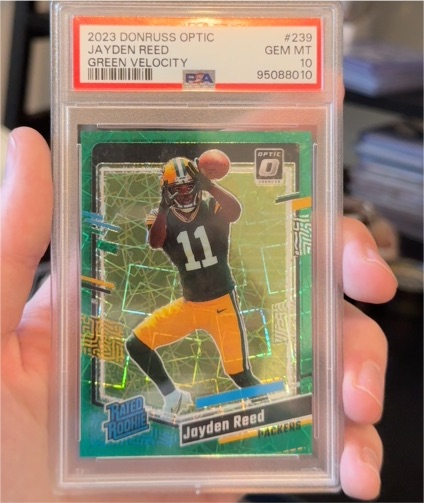 2023 Donruss Optic #239 Jayden Reed Green Velocity — front