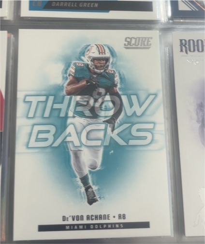 2025 Panini Score #9 De'Von Achane Throwbacks — front