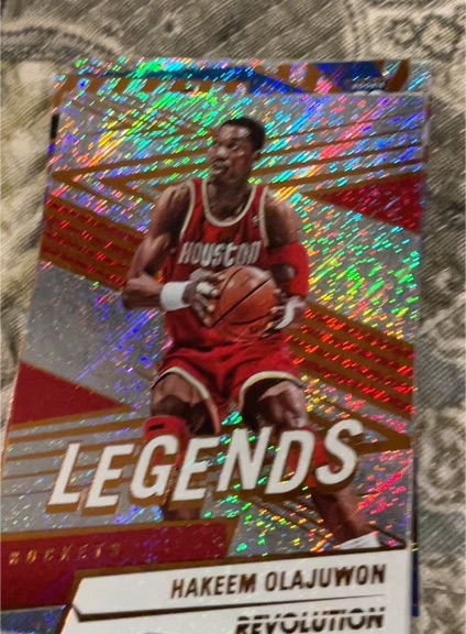 2024-25 Panini Revolution #168 Hakeem Olajuwon — front