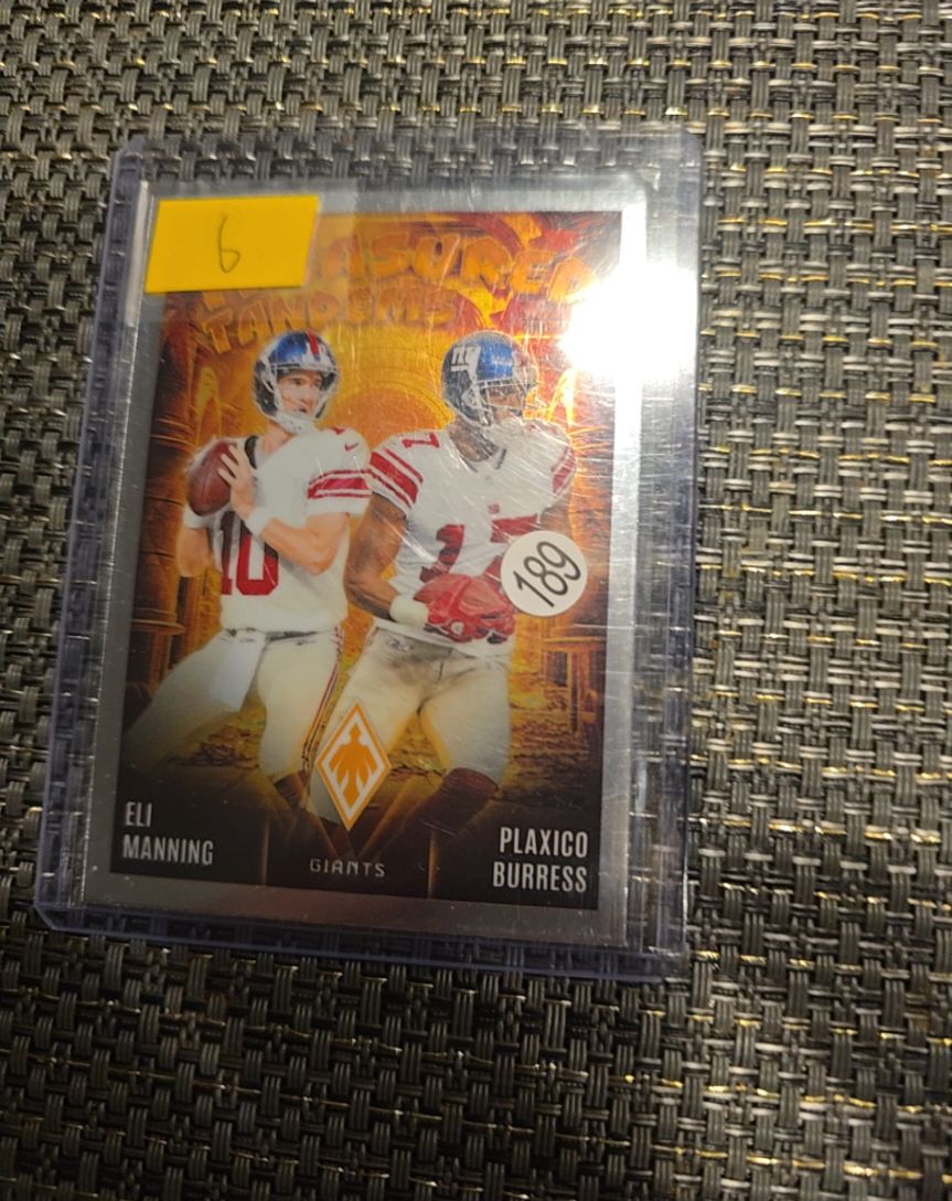 2024 Panini Phoenix Treasured Tandems #TT-NYG Eli Manning Plaxico Burress — front
