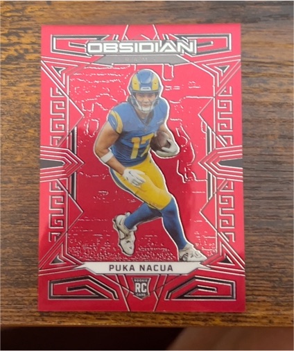 2023 Panini Obsidian #156 Puka Nacua — front