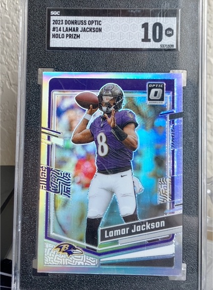 2023 Donruss Optic #14 Lamar Jackson Holo Prizm — front