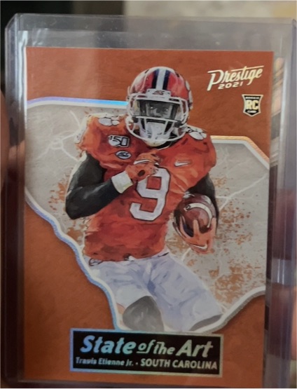 2021 Panini Prestige State of the Art #Travis Etienne Jr. — front