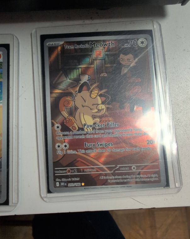 2023 Pokémon SV10: Destined Rivals #203 Team Rocket's Meowth Illustration Rare — front