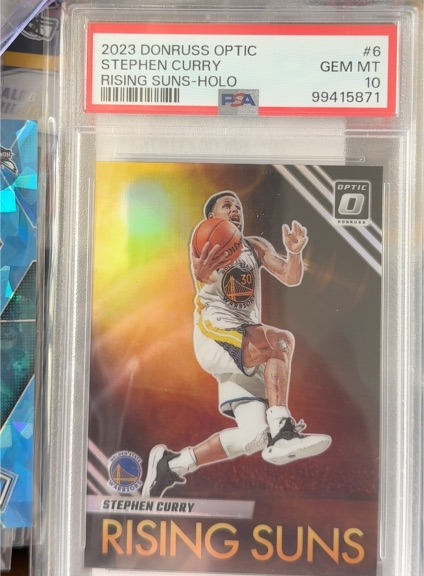 2023 Donruss Optic #6 Stephen Curry Rising Suns Holo — front