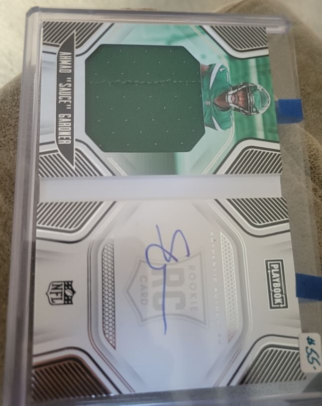 2022 Panini Playbook Ahmad "Sauce" Gardner Rookie Jersey Autograph Booklet — front