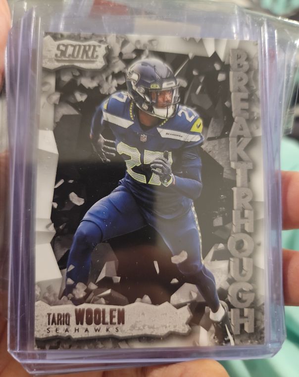 2023 Panini Score #12 Tariq Woolen Breakthrough — front
