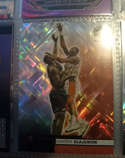 1999-00 Upper Deck HoloGrFX #22 Hakeem Olajuwon — front
