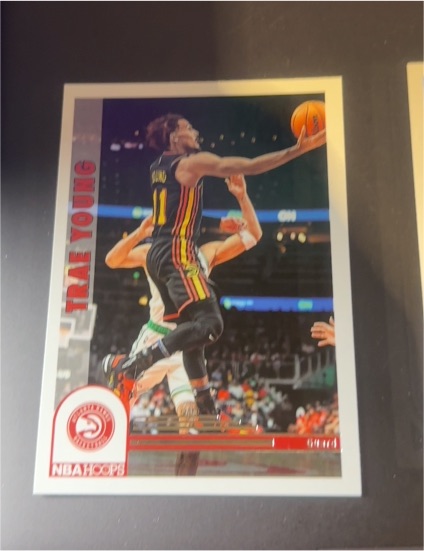 2022-23 Panini NBA Hoops Hoops Tribute #291 Trae Young — front