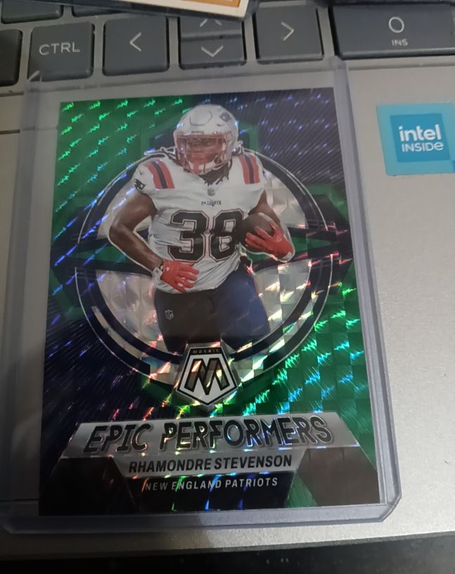 2023 Panini Mosaic Epic Performers Rhamondre Stevenson — front