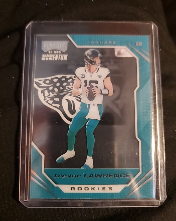 2021 Panini Chronicles Playoff Momentum Rookies #PMR-1 Trevor Lawrence — front