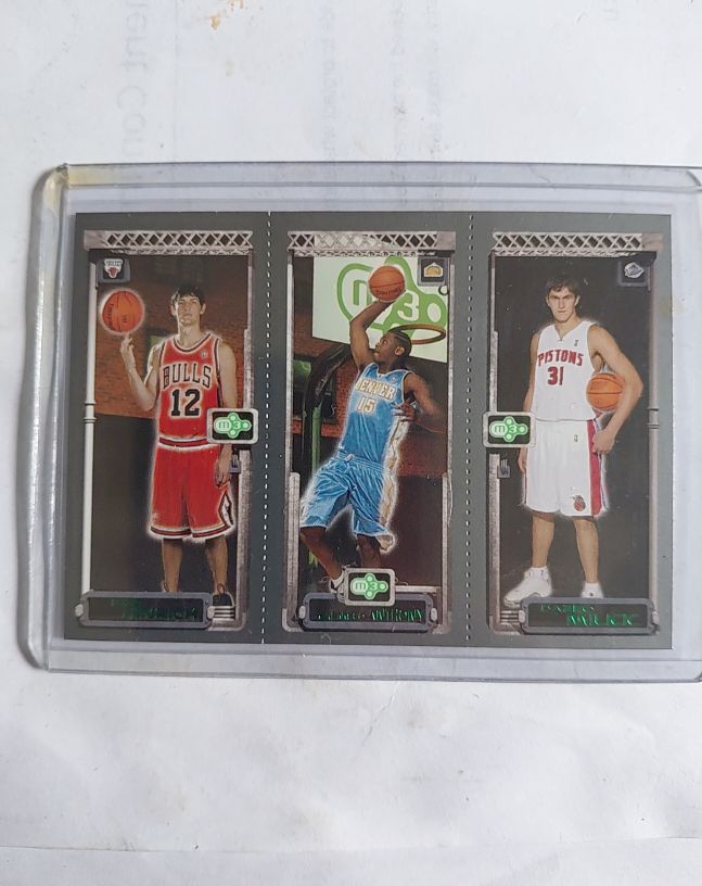2003-04 Topps Matrix #113 Kirk Hinrich Carmelo Anthony Darko Milicic — front