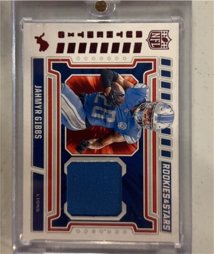 2024 Panini Rookies & Stars NFL Authentic #NA-JGS Jahmyr Gibbs — front