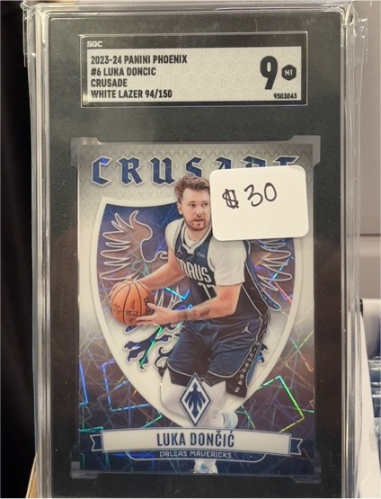 2023-24 Panini Phoenix #6 Luka Dončić Crusade White Lazer — front