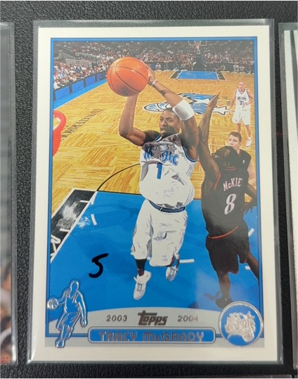 2003-04 Topps #1 Tracy McGrady — front