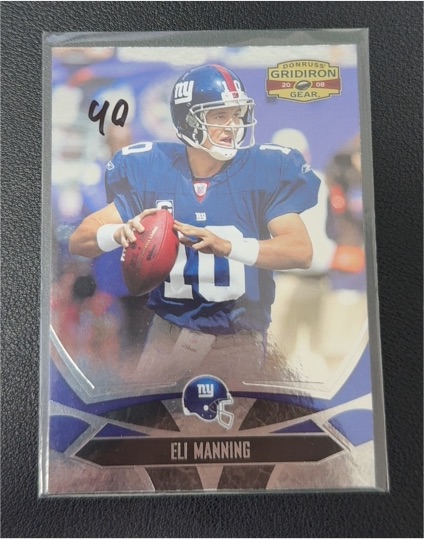 2008 Donruss Gridiron Gear #64 Eli Manning — front