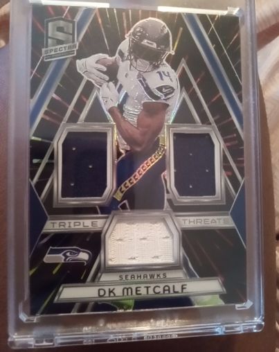 2024 Panini Spectra Triple Threats DK Metcalf — front