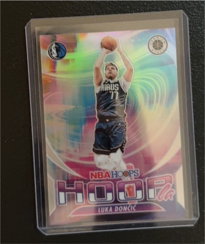 2023-24 Panini NBA Hoops Premium Stock #7 Luka Doncic — front