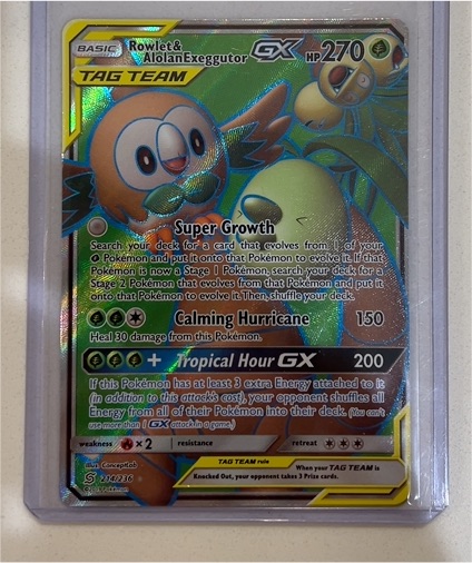 2019 Pokémon Sun & Moon Unified Minds #214 Rowlet & Alolan Exeggutor GX — front