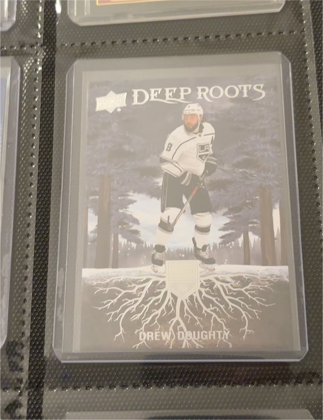 2023-24 Upper Deck Series 2 Deep Roots #DR-4 Drew Doughty — front