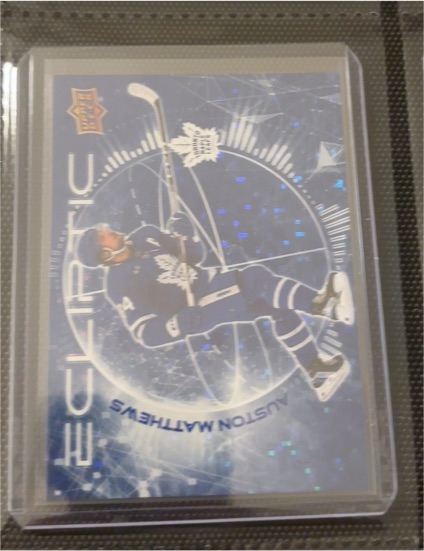 2023-24 Upper Deck Series 2 Ecliptic Sparkle #EC-10 Auston Matthews — front
