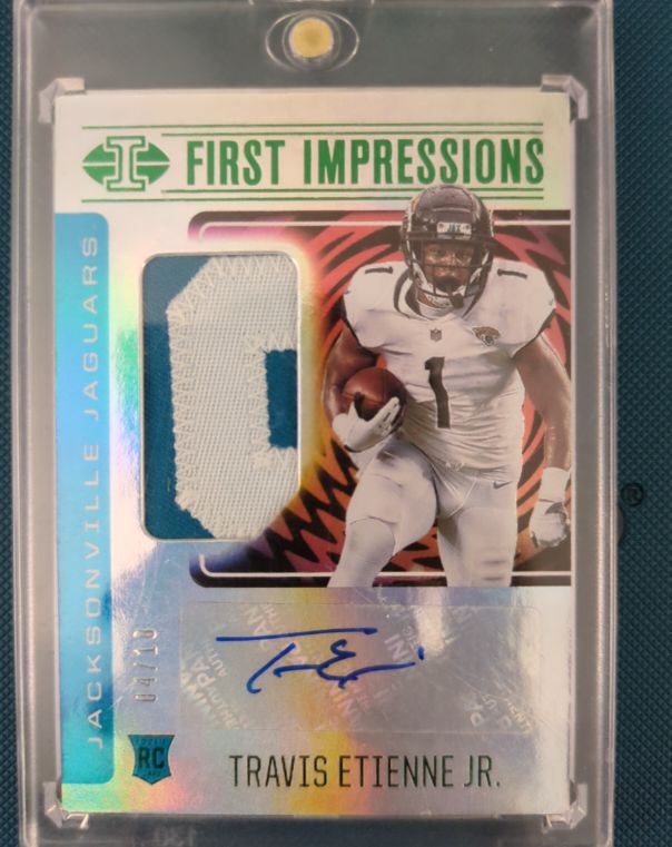 2021 Panini Illusions First Impressions Travis Etienne Jr. — front
