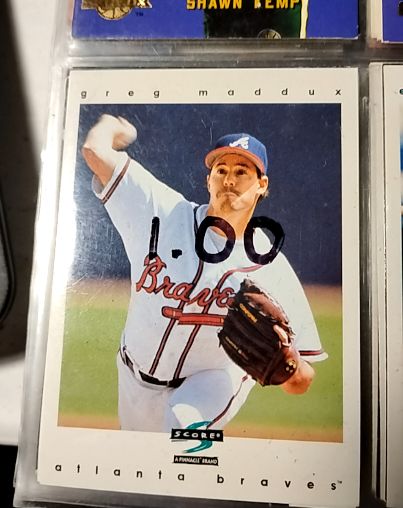 1997 Score #215 Greg Maddux — front